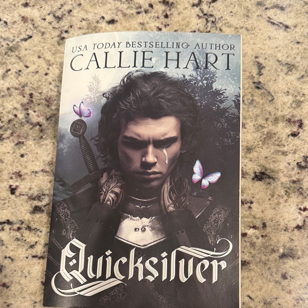 Quiksilver Book with Purple and Gray Cover